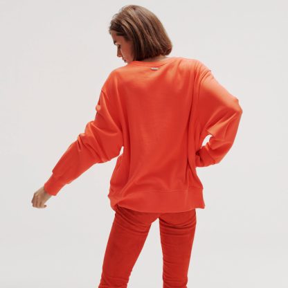 Quantum Courage pomarańczowa bluza z nadrukiem